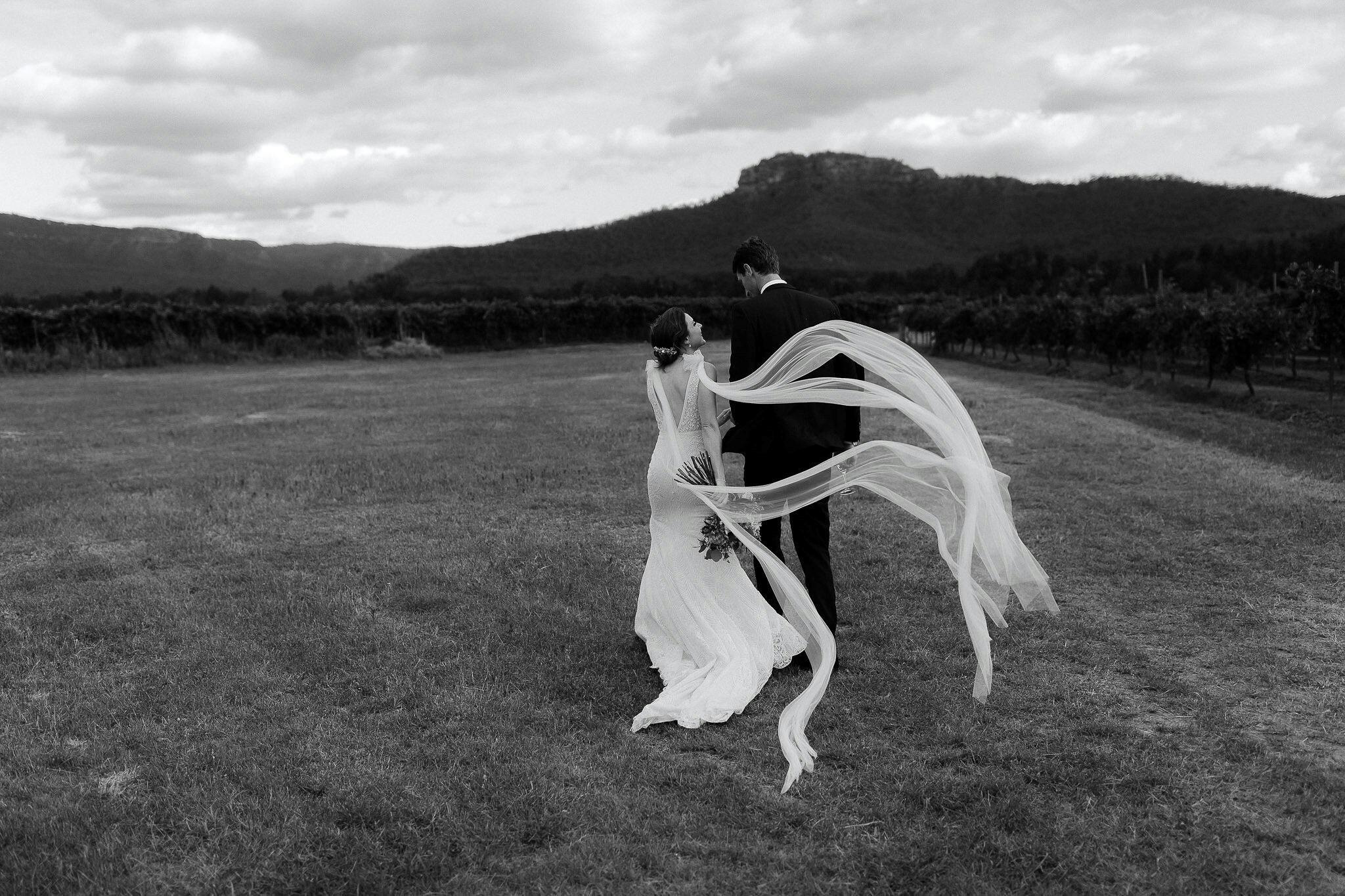 Wedding ceremony bec matt vines couple yellowrock landscape blackandwhite melissacox