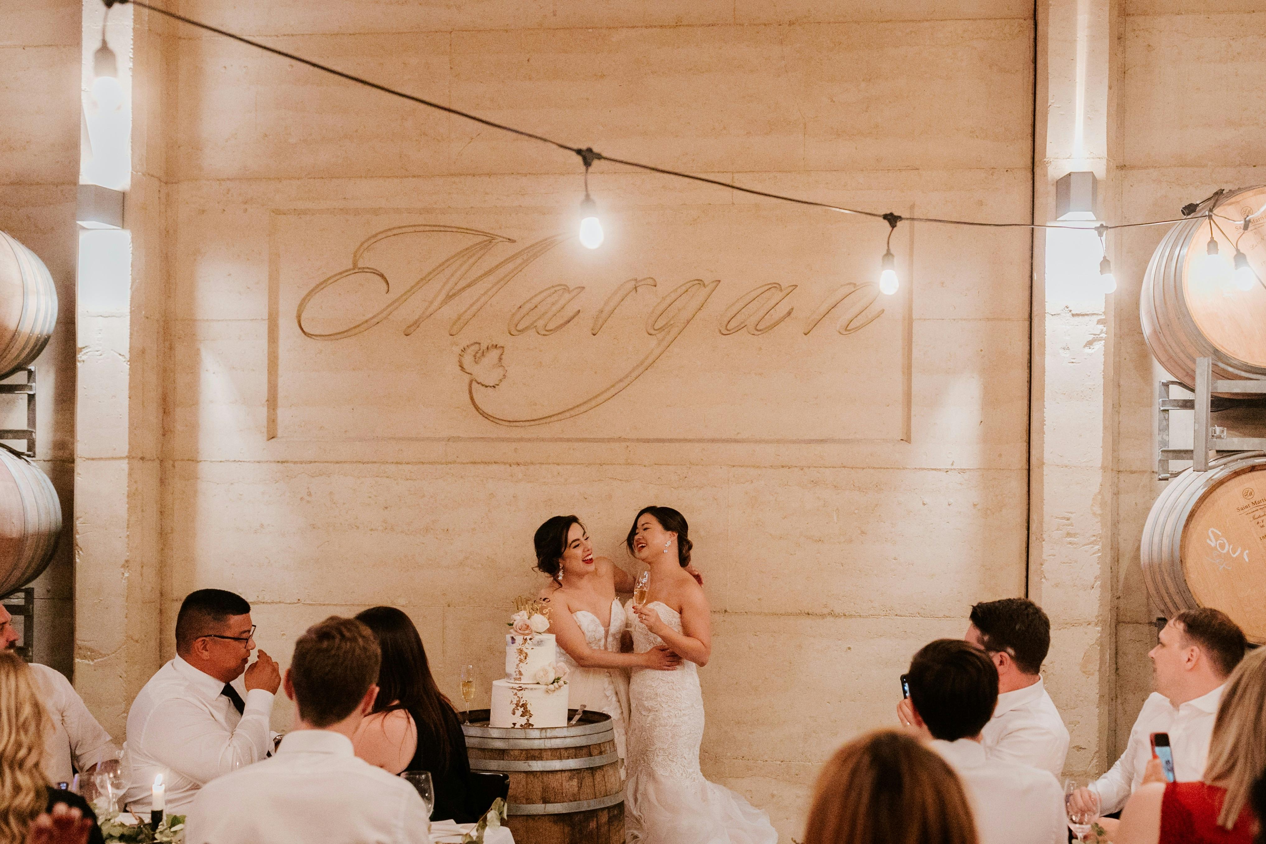 Wedding reception cakecutting festoonlightsfiona cath wedding gez xavier mansfield photography 945 1